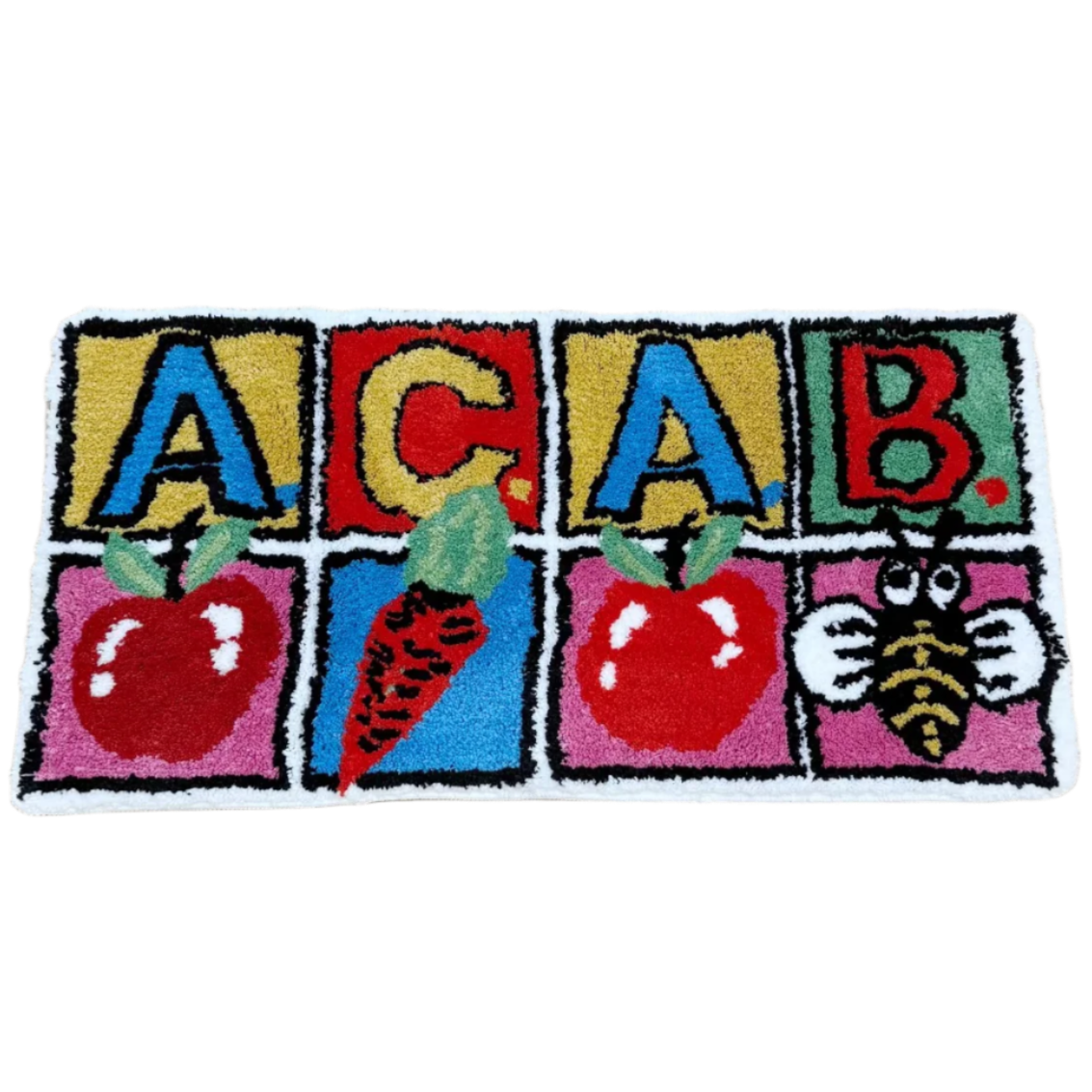 Tufted Rug with Children's block letters A-C-A-B with apple, carrot, apple, bumblebee illustrations underneath.