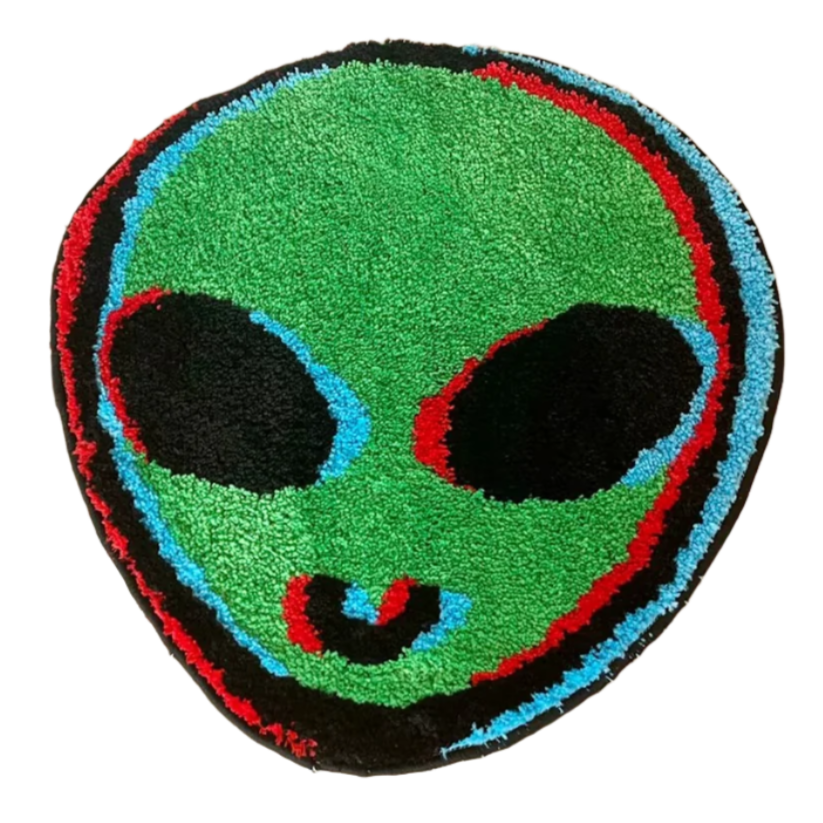 Alien head rug with glitch distortion in neon blue and pink hues.
