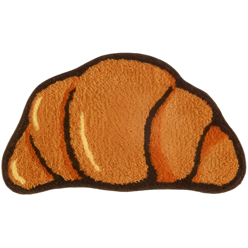 Plush handmade croissant-shaped rug in golden brown tones.