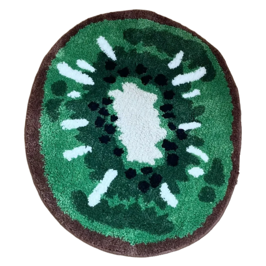 Handmade rug shaped like a sliced-open kiwi with green interior and seeds.