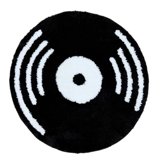 Black vinyl record rug with stylized grooves and bright center label.