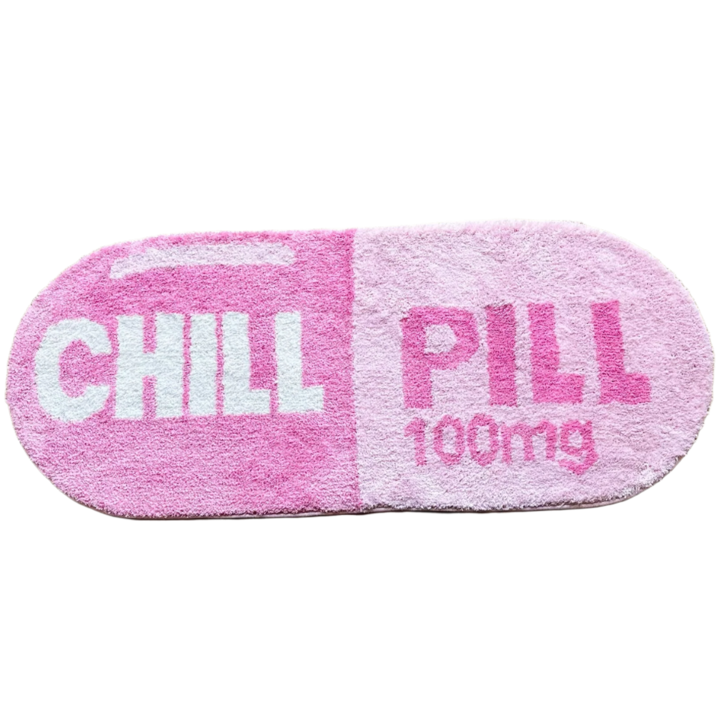 Handmade rug shaped like a pink and white capsule pill.