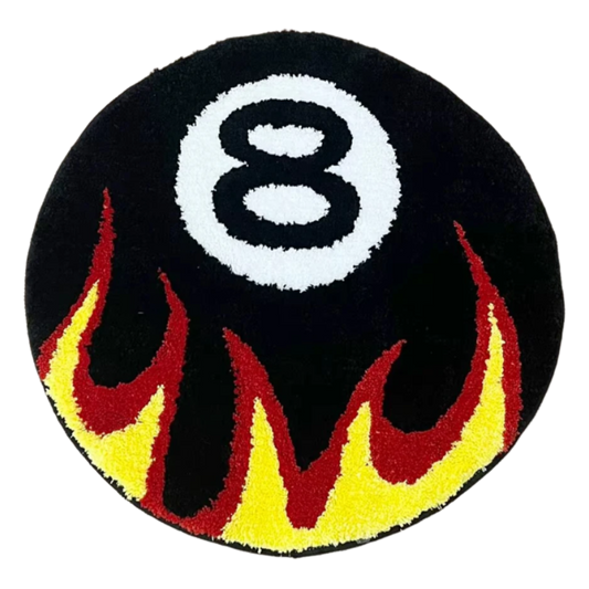 8 ball design rug with orange flames rising around the black ball.