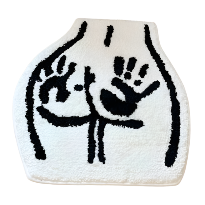 Cartoon butt on tufted rug with two handprints across the cheeks.
