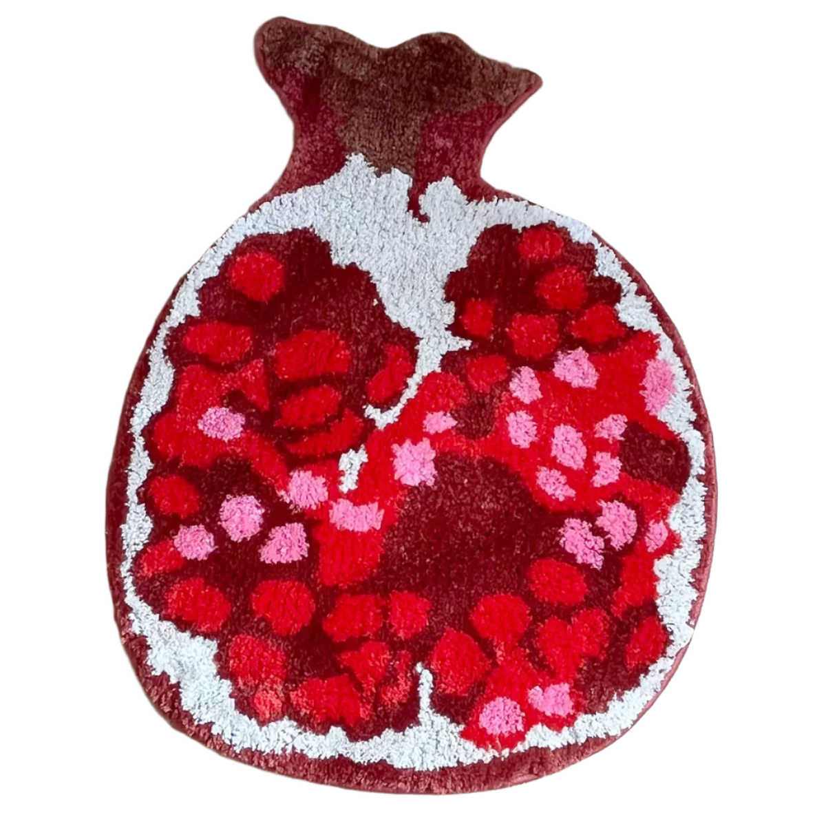 Rug shaped like a sliced pomegranate with vibrant seeds and red skin.