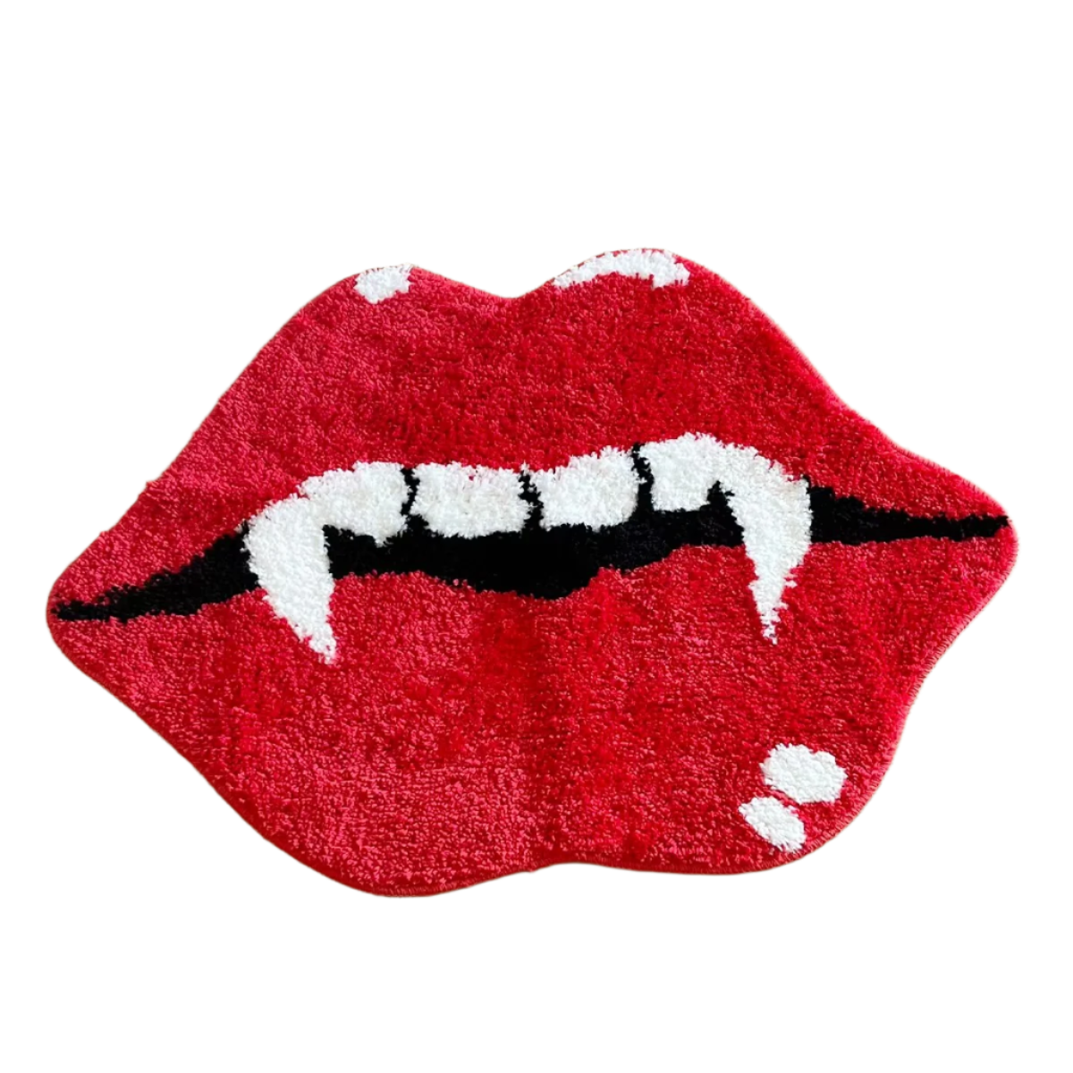 Red lips with sharp vampire fangs on a glossy, plush tufted rug.